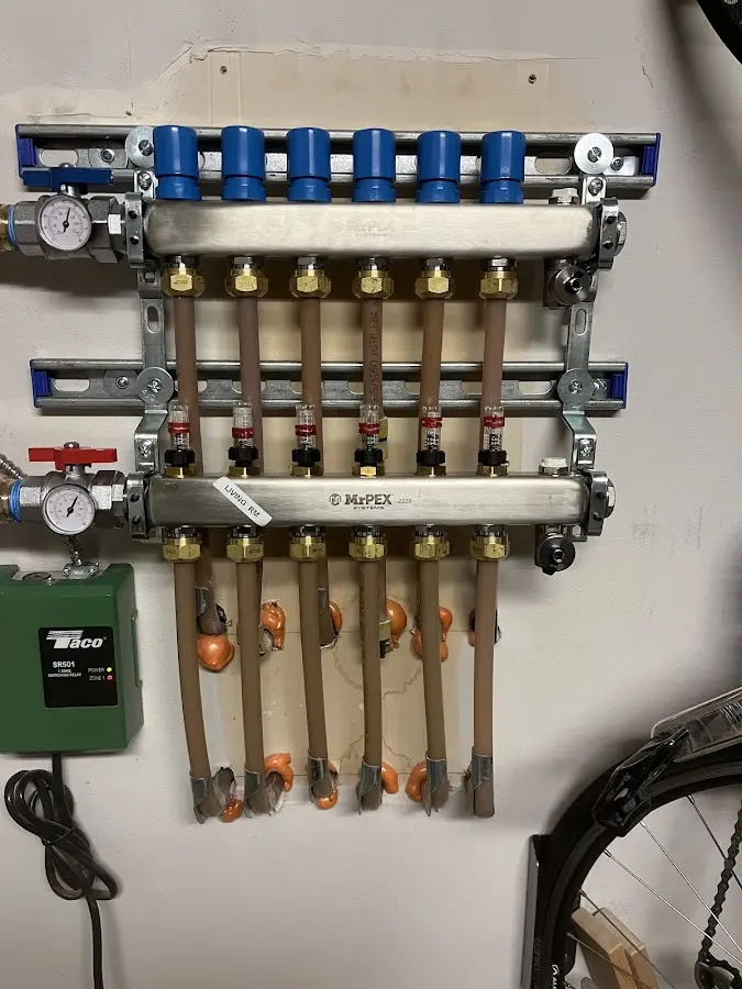 Plumber performing Gas Line Installation at a residential property in Carrollton